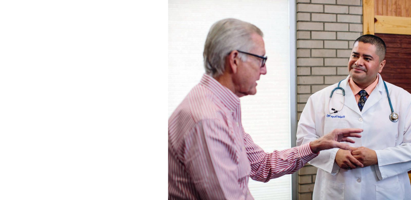 Dr. Huezo greeting a patient